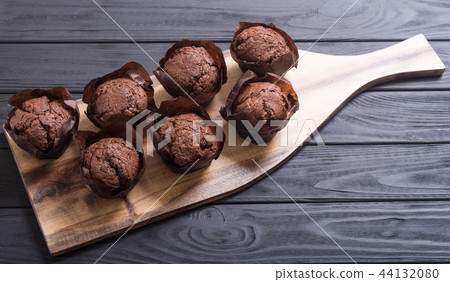 Sweet dessert chocolate muffins or cupcake 44132080