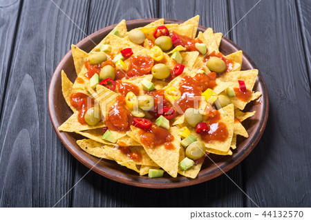 Nachos with sauce salsa Nachos with sauce salsa 44132570
