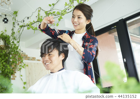 Female hairdresser male customer Female hairdresser male customer 44135152