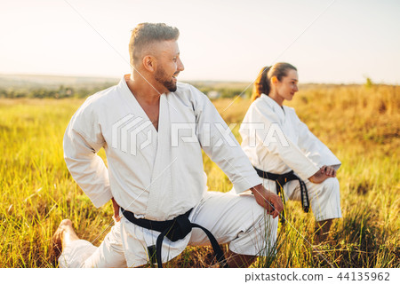 Two female karate with male instructor on training Two female karate with male instructor on training 44135962