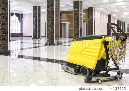 Cleaning machine in the empty office lobby Cleaning machine in the empty office lobby 44137525