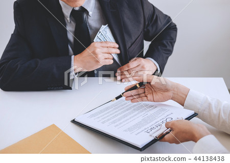 Bribery and corruption concept, bribe in the form of dollar bill 44138438
