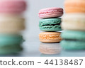 Sweet and colorful macaroon cookies tower. 44138487