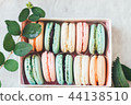 Sweet and colorful macaroon cookies in a box. cozy 44138510