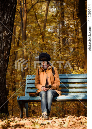 Hipster girl in a park 44139644
