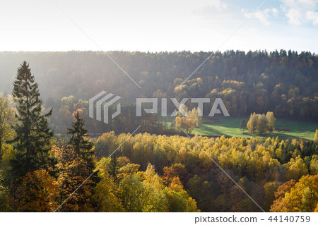 Majestic landscape with autumn forest hills. Sigulda, Latvia, Europe Majestic landscape with autumn forest hills. Sigulda, Latvia, Europe 44140759