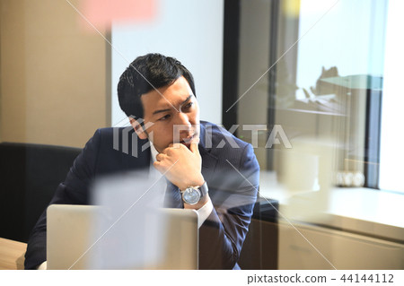 Worried businessman office Worried businessman office 44144112