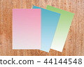 Colorful blank paper on wooden background  44144548