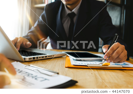 business documents on office table with smart phon 44147070