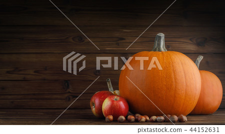 Autumn harvest on wooden table 44152631