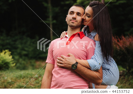 Portrait of beautiful couple in autumn weather. 44153752