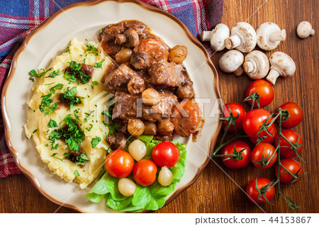 Dinner or lunch with beef Bourguignon stew 44153867