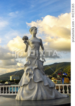 Sculpture of bride girl in dress with bouquet of b Sculpture of bride girl in dress with bouquet of b 44155165