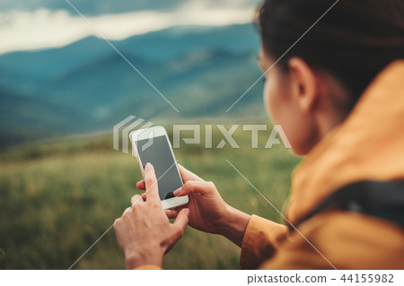Close up of a smartphone in hands of a nice woman 44155982