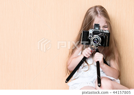 Little girl shoots on camera Little girl shoots on camera 44157805