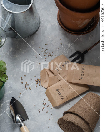 Various seeds of herbs and garden tools and pots Various seeds of herbs and garden tools and pots 44162500