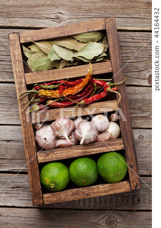 Dry spices in wooden box Dry spices in wooden box 44164432