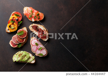 Brushetta or traditional spanish tapas 44164447