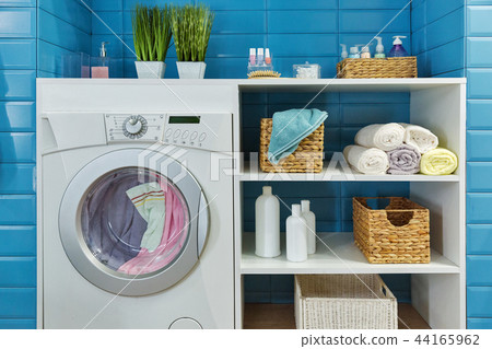 modern bathroom with washing machine 44165962