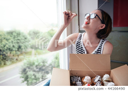 girl eating tasty cakes, sweet food and pleasure girl eating tasty cakes, sweet food and pleasure 44166490