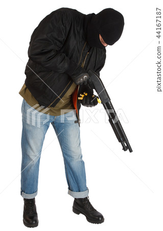mobster in black mask with shotgun 44167187