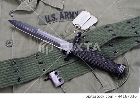 M16 rifle bayonet on uniform bacground M16 rifle bayonet on uniform bacground 44167330