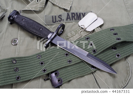 M16 rifle bayonet on uniform bacground M16 rifle bayonet on uniform bacground 44167331