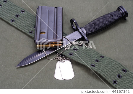 M16 rifle bayonet on uniform bacground M16 rifle bayonet on uniform bacground 44167341