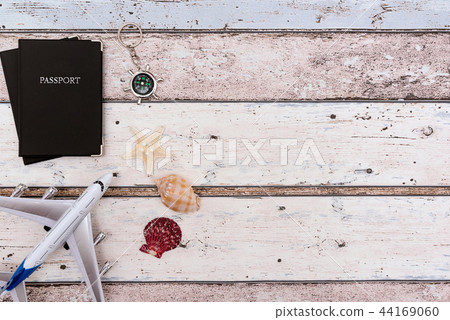 Summer Travel accessories on wooden background Summer Travel accessories on wooden background 44169060