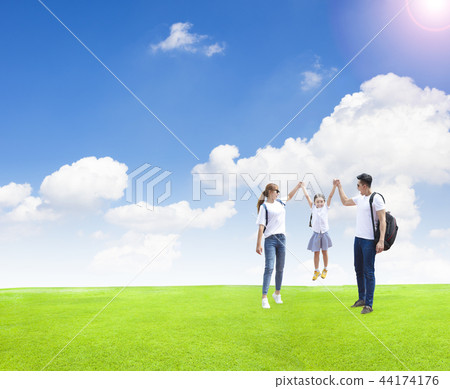 Happy family playing with child in the park. Happy family playing with child in the park. 44174176