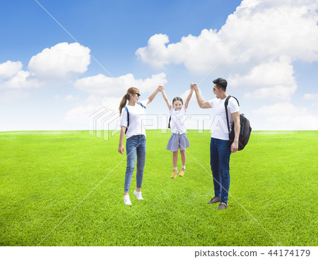 Happy family playing with child in the park. Happy family playing with child in the park. 44174179