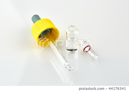 Ampoule with medicine and pipette 44176341