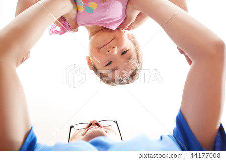 Father and daughter playing Father and daughter playing 44177008