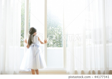 A girl in a dress A girl in a dress 44177341