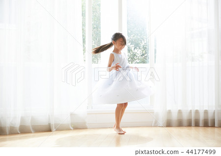 A girl in a dress 44177499
