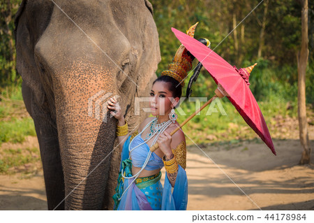 Thai girl with elephant 44178984