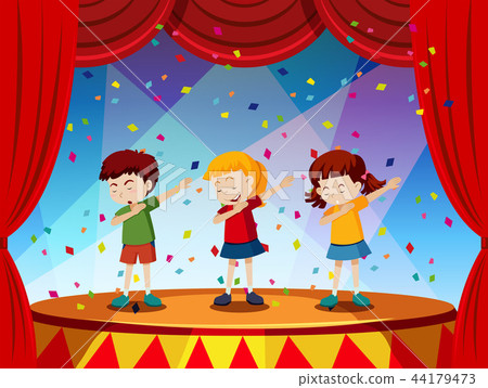 Group of children perform on stage 44179473