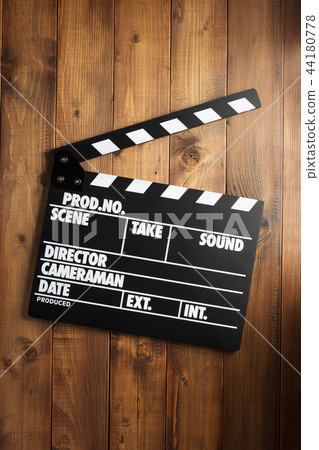 movie clapper board at wooden background 44180778