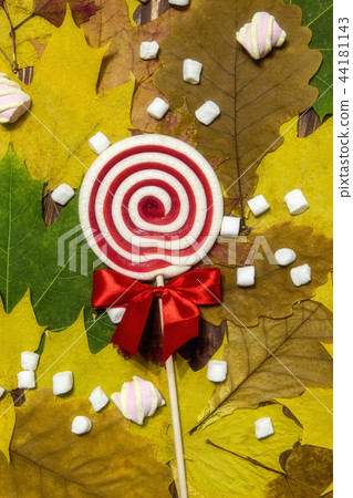 Bright autumn leaves marshmallow and candy Bright autumn leaves marshmallow and candy 44181143