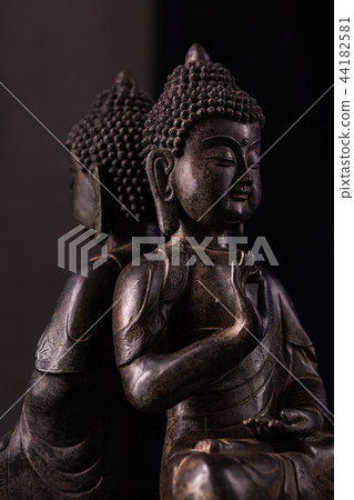 Buddha Shakyamuni's figure in a pose vitarka mudra 44182581