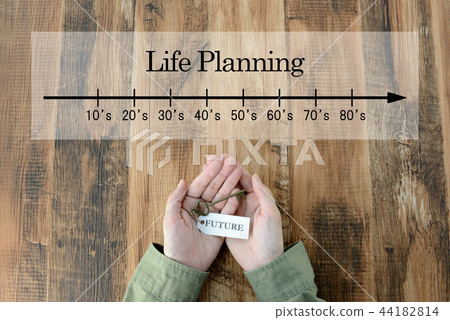 Person's hand thinking about life planning 44182814