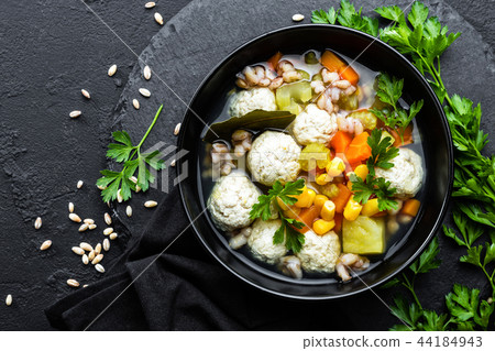 Delicious vegetable soup with chicken meatballs Delicious vegetable soup with chicken meatballs 44184943