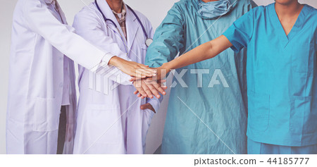 Doctors and Nurses coordinate hands. Doctors and Nurses coordinate hands. 44185777