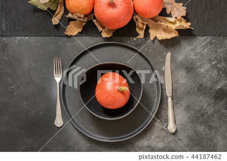 Thanksgiving Day table place setting on black. Thanksgiving Day table place setting on black. 44187462
