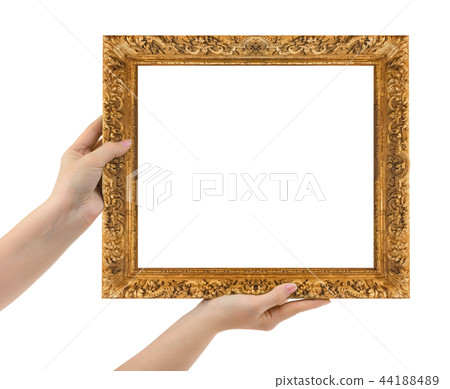 Wooden picture frame in hands 44188489