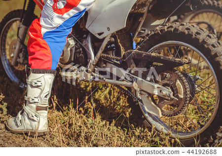 woman on enduro motocross in motion, 44192688