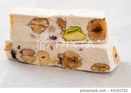 Nougat on white background. Copy space. Christmas sweet. 44192702