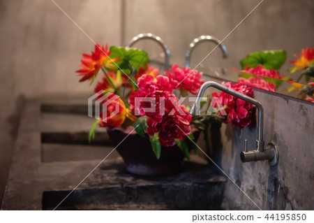 Modern Bathroom or toilet counter with flowers Modern Bathroom or toilet counter with flowers 44195850