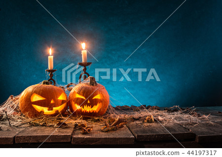 Halloween pumpkins on old wooden planks. Halloween pumpkins on old wooden planks. 44197317