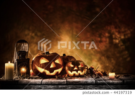 Halloween pumpkins on old wooden planks. Halloween pumpkins on old wooden planks. 44197319